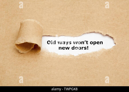 Inspirational quote Old Ways Will Not Open New Doors typed on vintage typewriter. Stock Photo