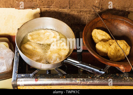 Fried bread for breakfast, Luquina Chico, Lake Titicaca, Peru, South America Stock Photo