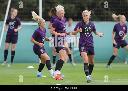 England's Steph Houghton (front right) during the training session at the Stade Municipal Saint-Amand-les-Eaux. Stock Photo