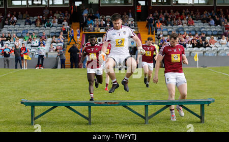 Westmeath, Ireland. June 22nd 2019, TEG Cusack Park, Westmeath, Ireland; GAA Football All-Ireland Senior Championship Westmeath versus Limerick; Westmeath goalkeeper Eoin Carberry jumps over the bench for the pre-match team photo Credit: Action Plus Sports Images/Alamy Live News Stock Photo