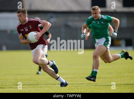 Westmeath, Ireland. June 22nd 2019, TEG Cusack Park, Westmeath, Ireland; GAA Football All-Ireland Senior Championship Westmeath versus Limerick; Ger Egan (Westmeath) gets away from Gordon Brown (Limerick) on an attacking run Credit: Action Plus Sports Images/Alamy Live News Stock Photo