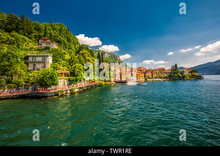 VARENNA, ITALY - June 1, 2019 - Varenna old town with the mountains in the background, Italy, Europe. Stock Photo