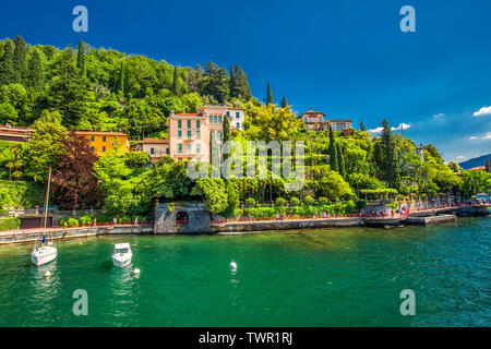 VARENNA, ITALY - June 1, 2019 - Varenna old town with the mountains in the background, Italy, Europe. Stock Photo