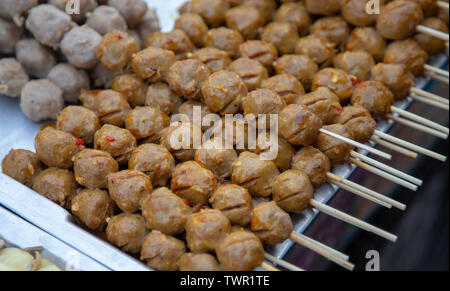 grill meat balls with stick the famous street food of Thailand. Stock Photo