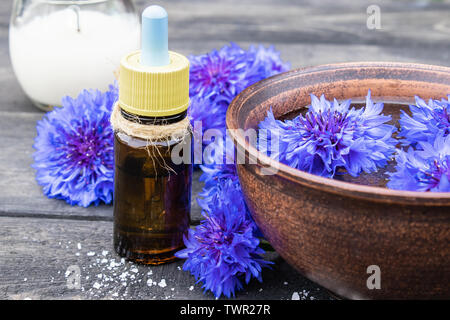 Cornflower essential oil. Cornflower flowers Close-up. Stock Photo