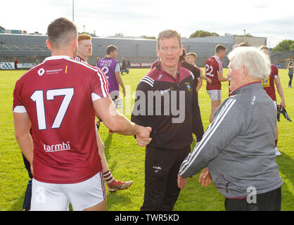 TEG Cusack Park, Westmeath, Ireland. 22nd June, 2019. GAA Football All-Ireland Senior Championship Westmeath v Limerick; Westmeath manager Jack Cooney congratulates Noel Mulligan at full time Credit: Action Plus Sports/Alamy Live News Stock Photo