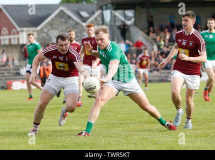 TEG Cusack Park, Westmeath, Ireland. 22nd June, 2019. GAA Football All-Ireland Senior Championship Westmeath v Limerick; Kieran Martin (Westmeath) and Adrian Enright (Limerick) challenge for the ball Credit: Action Plus Sports/Alamy Live News Stock Photo