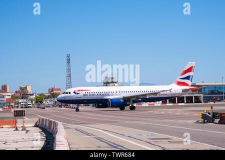 Gibraltar International Airport with British Airways flight crossing the