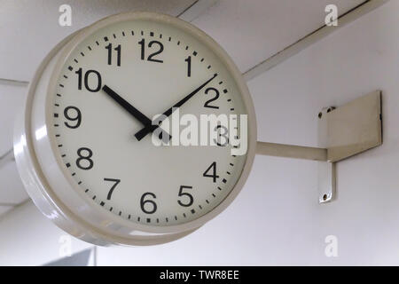 Vintage or retro white wall clock Stock Photo