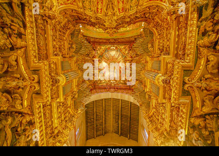 Braga, Portugal - August 12, 2017: Organ and ceiling of Braga Cathedral. This choir is decorated with a painted ceiling and sculptured gilt wood. Se Stock Photo