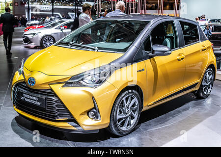 Paris, France, October 03, 2018: metallic gold Toyota Yaris 20th Anniversary Hybrid at Mondial Paris Motor Show, produced by Japanese Toyota Stock Photo