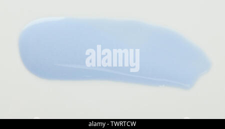 Light blue paint stroke isolated on white background close up view Stock Photo