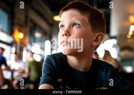 Boy playing video game Stock Photo