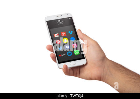 June 22, 2019. Athens, Greece. Male hand holding a smartphone with social media apps icons, isolated against white color background, close up view Stock Photo