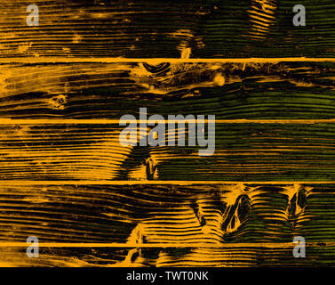 Abstract background. Wooden structure of pine planks in yellow burnt color. Stock Photo
