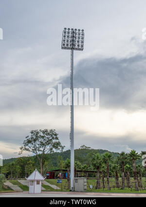 Electric post spotlight in park Stock Photo