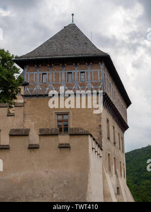 Burgrave's House at Karlstejn Castle. A gothic, medieval half timbered house perched over the walls of the royal castle in Bohemia, Czach Republic. Stock Photo