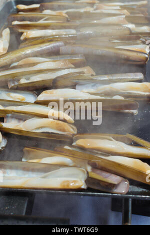 delicious razor shell seafood grilled outdoors Stock Photo - Alamy