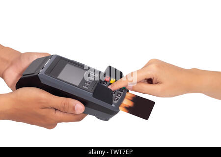 close up of hand entering credit card pin code for security password in credit card swipe machine at point of sale terminal isolated on white backgrou Stock Photo