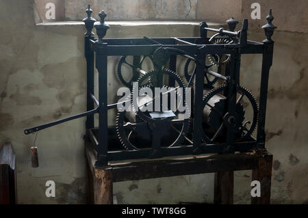 Old clock mechanism in St. Nicholas Church, Bringhurst, Leicestershire, England, UK Stock Photo