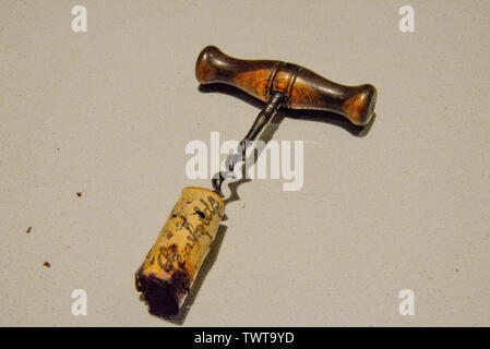 Antique Wooden Corkscrew with Penfolds Grange Cork Attached Stock Photo