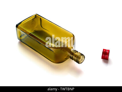 Empty glass bottle for alcoholic drinks or water on a white background. Stock Photo