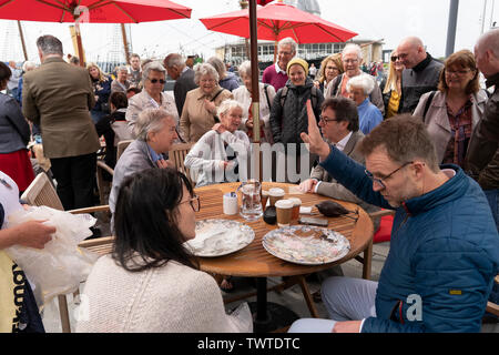 Dundee, Scotland, UK. 23 June 2019. The BBC Antiques Roadshow TV programme is aiming on location t the new V&A Museum in Dundee today. Long queues formed as members of the public arrived with their collectables to have them appraised and valued by the Antiques Roadshow experts. Select items and their owners were chosen to be filmed for the show. Credit: Iain Masterton/Alamy Live News Stock Photo