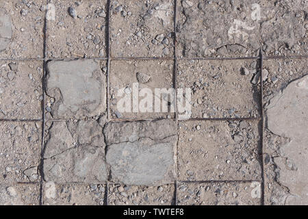 Old weathered concrete with exposed mesh Stock Photo