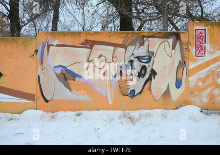 Fragment of colored street art graffiti paintings with contours and shading close up. Background texture of youth contemporary art culture. Orange, re Stock Photo