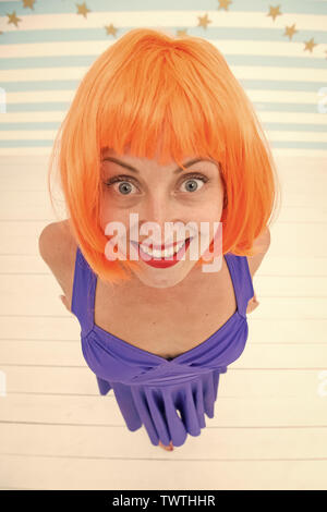 wow. it looks perfect. crazy girl looks incredible. wow look and positive emotions. what a nice surprise. orange hair of happy crazy girl. dont worry be happy Stock Photo