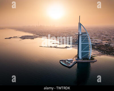 Dubai seaside skyline with luxury hotel aerial view at sunrise Stock Photo
