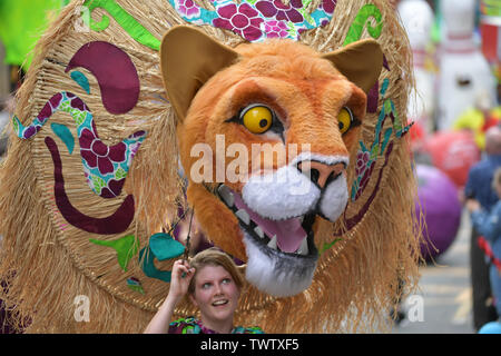 Manchester, UK. 23rd June 2019. Participants take part in the Manchester Day parade, an annual event that celebrates the city. This year’s theme is ’10 out of 10’ © Russell Hart/Alamy Live News. Stock Photo