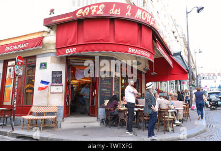 The Cafe des 2 Moulins in French for Two Windmills is a cafe in the Montmartre, Paris, France. Stock Photo