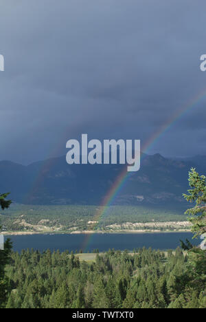 A rainbow after the rain over lake Vyrnwy Stock Photo - Alamy