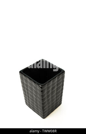 Black ceramic square vase on white background.(with Clipping Path). Stock Photo