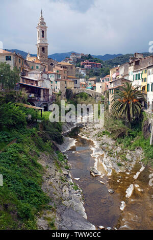 The medieval village Dolcedo with stone bridge Ponte Grande and church San Tommaso, province Imperia, Liguria, Italy Stock Photo
