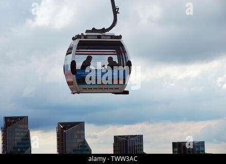 LONDON, UK - JUN 11 2019: Emirates cable car. This service is London’s first urban cable car which crosses the Thames from Excel centre to the O2 Stock Photo
