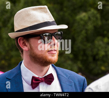 Man wearing trilby hat and sunglasses in Valley Gardens on 1940s Day, Harrogate, England, UK, 23rd June 2019. Stock Photo