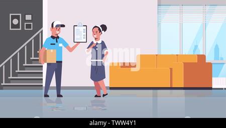 postman in uniform holding cardboard parcel box courier showing clipboard to woman recipient express delivery service concept modern living room Stock Vector