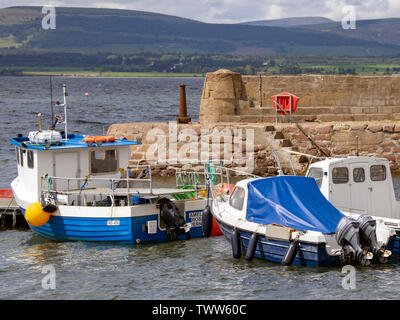 Boats in Cromarty Harbour on a sunny day, Cromarty, Black Isle, Ross and Cromarty, Scotland, United Kingdom. Stock Photo