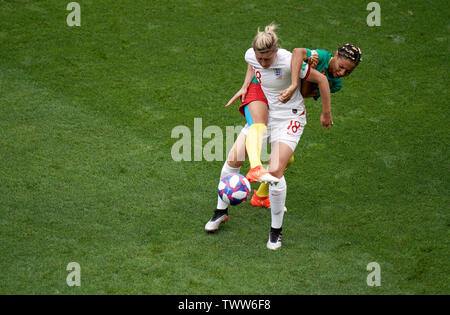 England's Ellen White (left) and Cameroon's Estelle Johnson (right) battle for the ball during the FIFA Women's World Cup, round of Sixteen match at State du Hainaut, Valenciennes. Stock Photo