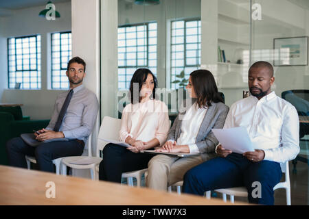 Diverse job applicants waiting for their job interviews Stock Photo