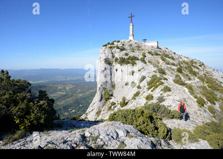 Walker near the Summit of Mont or Montagne Sainte-Victoire Mountain Aix-en-Provence Provence France Stock Photo