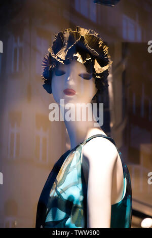 Belgrade, Serbia - June 19, 2019: One mannequin doll in summer outfit displayed n the shop window of Max Mara clothing expensive and elegant brand Stock Photo