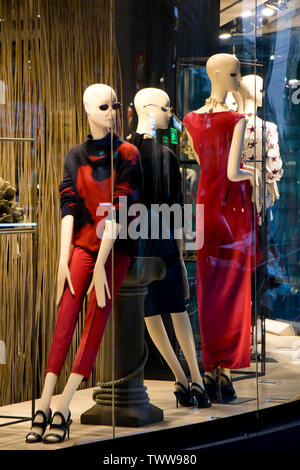 Belgrade, Serbia - June 19, 2019: One mannequin doll in summer outfit displayed n the shop window of Max Mara clothing expensive and elegant brand Stock Photo