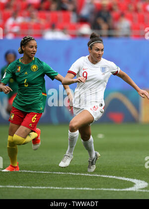 Cameroon's Estelle Johnson (left) and England's Jodie Taylor battle for the ball during the FIFA Women's World Cup, round of Sixteen match at State du Hainaut, Valenciennes. Stock Photo