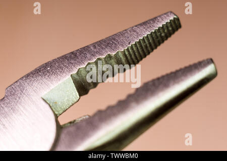 elements small foldable steel multitool, closeup, macro Stock Photo