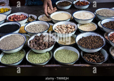 Bowls of legumes and spices in a market stall in Old Delhi, New Delhi, India Stock Photo