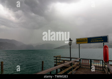 Steinbach am Attersee: lake Attersee, rain storm, jetty in Salzkammergut, Oberösterreich, Upper Austria, Austria Stock Photo