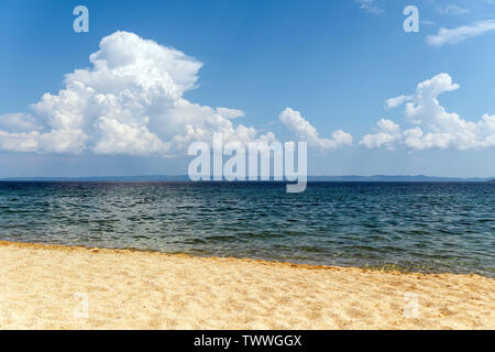 Sea sand sky concept. Sand on beach and blue summer sky, calmness and nature concept Stock Photo